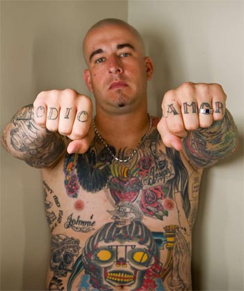 Mental Health Break: World's worst tattoo mistakes put on long sleeves to cover the modest tattoo on his wrist.