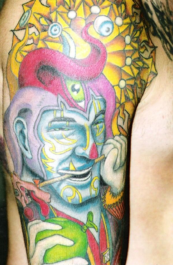 Source url:http://tattoo-ink-tribal.blogspot.com/2010/03/jester-tattoo- 