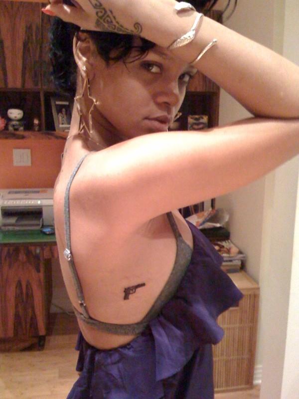  tattoo a bit higher, between her shoulder 