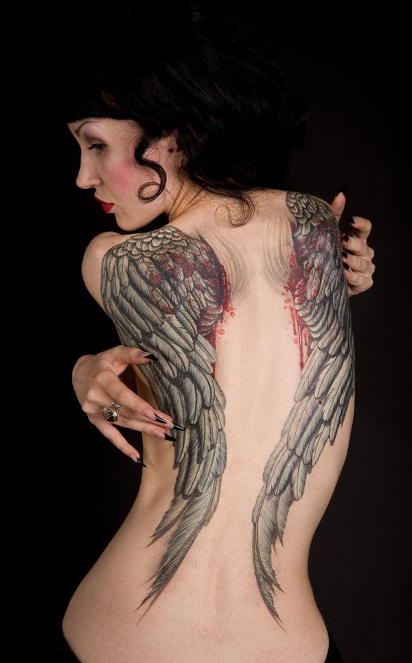 Wings are a mostly inseparable part of the angel tattoo design