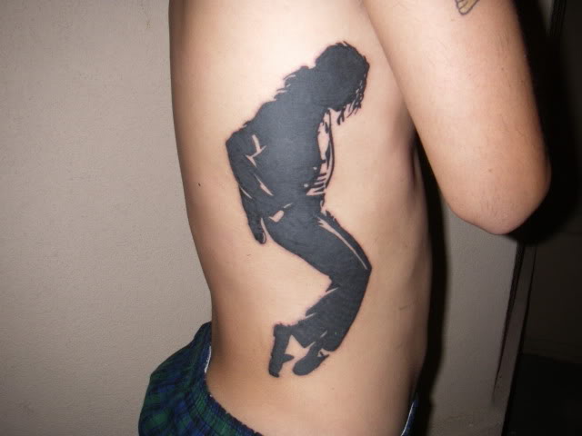 tattoos on ribs. michael jackson ribs tattoo